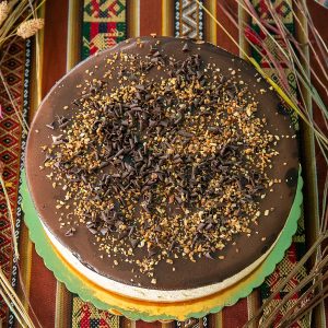 Cheesecake de lúcuma con glaseado de chocolate